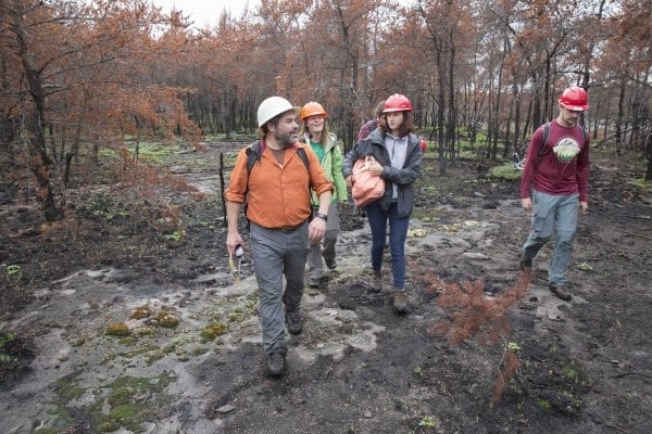 A fire burned more than 500 acres of the Altona Flat Rock forest in July, providing the perfect setting for SUNY Plattsburgh students studying forest ecology. Photo by Mike Lynch