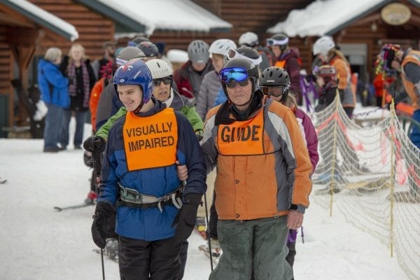 The Adaptive Winter Sports Program is one of many programs the Double H Ranch in Lake Luzerne offers children with chronic illnesses or disabilities. Photo by Mike Lynch
