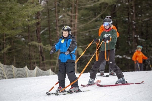 The Adaptive Winter Sports Program is one of many programs the Double H Ranch in Lake Luzerne offers children with chronic illnesses or disabilities. Photo by Mike Lynch