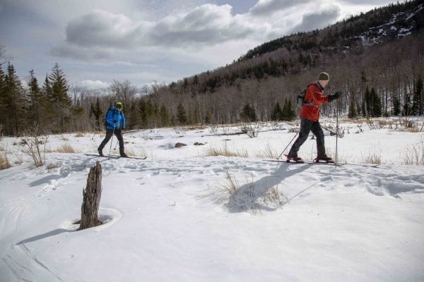 BETA executive director Josh Wilson skis Old Mountain Road with former Explorer editor Phil Brown in March 2018. Photo by Mike Lynch