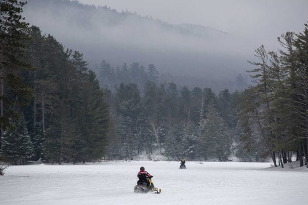 Snowmobiles on Long Lake in Hamilton County. Photo by Mike Lynch