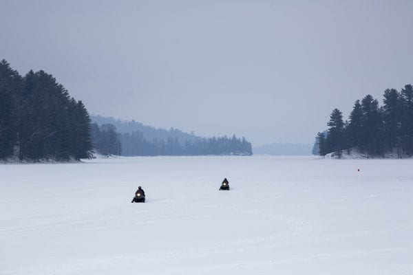 Snowmobiles on Long Lake in Hamilton County. Photo by Mike Lynch