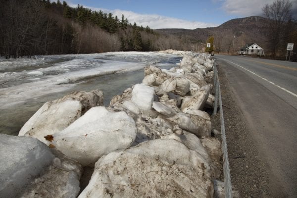 River ice piled along state Route 9N in Upper Jay. It was removed from the river by crews earlier this winter. Photo by Mike Lynch