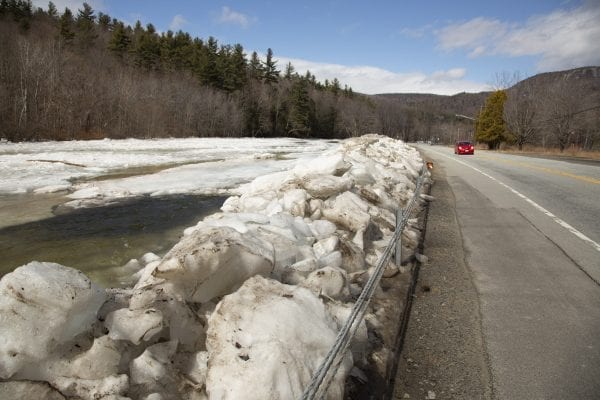 River ice piled along state Route 9N in Upper Jay. It was removed from the river by crews earlier this winter. Photo by Mike Lynch