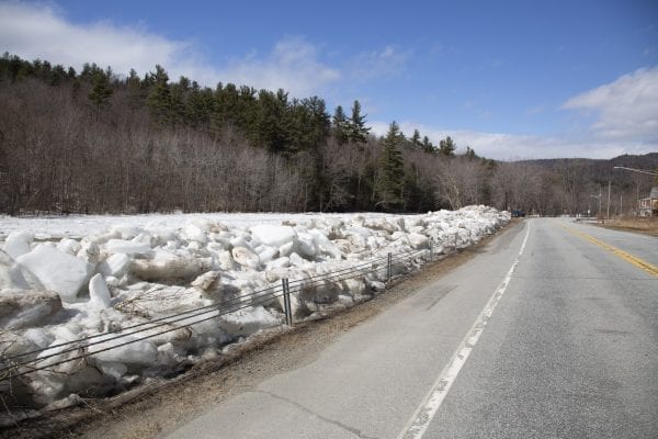 River ice piled along state Route 9N in Upper Jay. It was removed from the river by crews earlier this winter. Photo by Mike Lynch