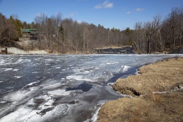 A frozen section of the West Branch of the Ausable River above the dam in Wilmington. Photo by Mike Lynch