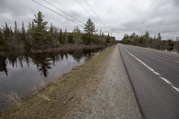 The Raquette River approaches Route 3 near Tupper Lake on April 25. Photo by Mike Lynch