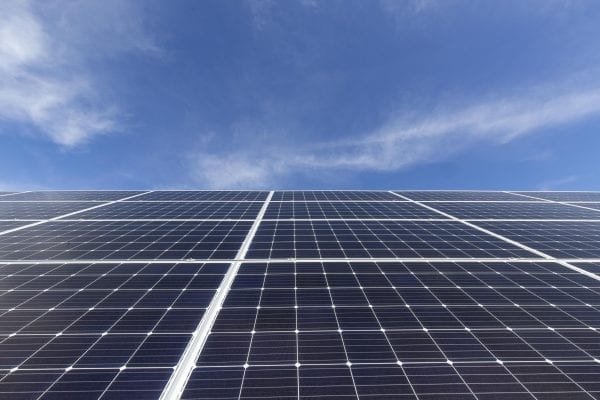 solar panels and cell tower