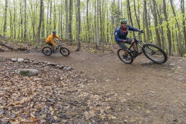Mountain bikers take on McCauley Mountain in Old Forge in May. Photo by Mike Lynch