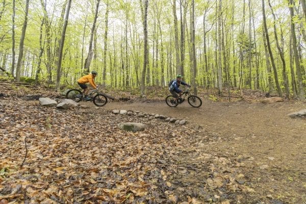 Mountain bikers take on McCauley Mountain in Old Forge in May. Photo by Mike Lynch