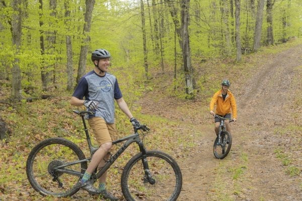 Mountain bikers take on McCauley Mountain in Old Forge in May. Photo by Mike Lynch