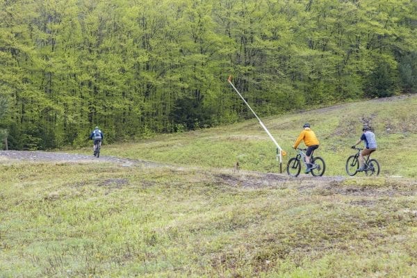 Mountain bikers take on McCauley Mountain in Old Forge in May. Photo by Mike Lynch