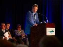 John E. Kelly, III, the executive vice president of IBM, speaks at the annual meeting of the Fund for Lake George July 6.