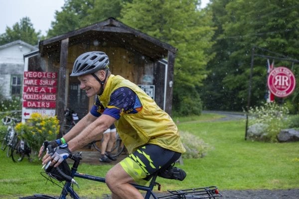 A Cycle Adirondacks participant enters Reber Rock Farm for a scheduled lunch break. Photo by Mike Lynch