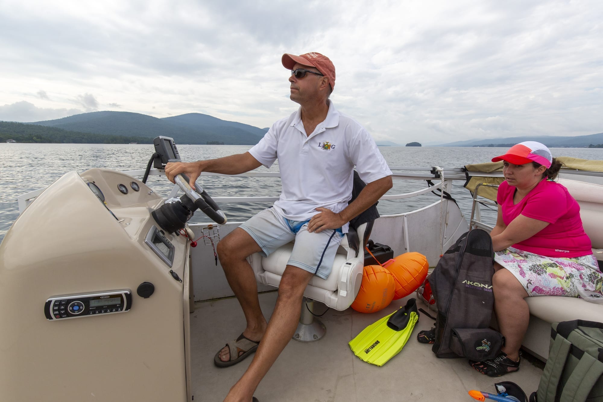 David Wick, executive director of the Lake George Park Commission, drives a crew of swimmers looking for milfoil on Lake George.