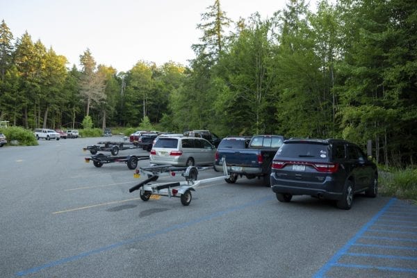 The boat launch parking lot at Second Pond, which provides access to Lower Saranac Lake. Photo by Mike Lynch