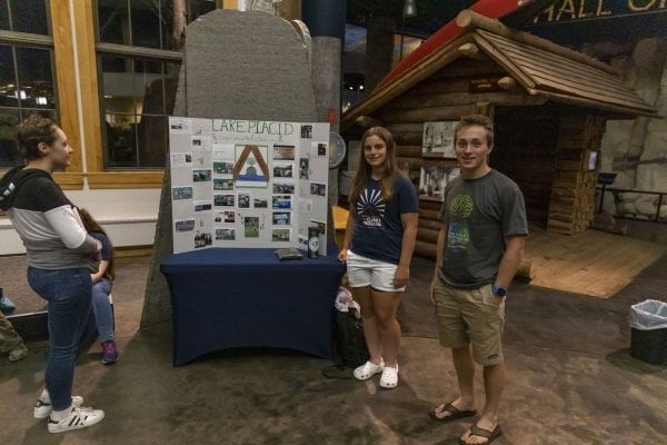 Students set up displays in the lobby at The Wild Center for the event. Photo by Mike Lynch