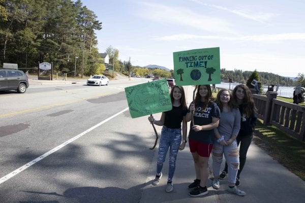 Many high school students from the Tri-Lakes left school to participate in Friday's climate strike held at Riverside Park in Saranac Lake. Overall several hundred people attended the demonstration. Photo by Mike Lynch