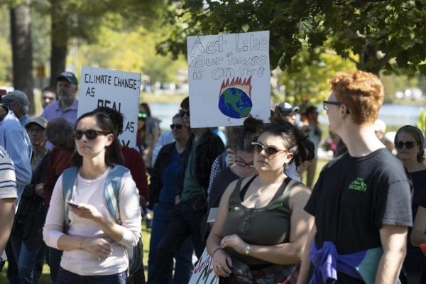 Many high school students from the Tri-Lakes left school to participate in Friday's climate strike held at Riverside Park in Saranac Lake. Overall several hundred people attended the demonstration. Photo by Mike Lynch