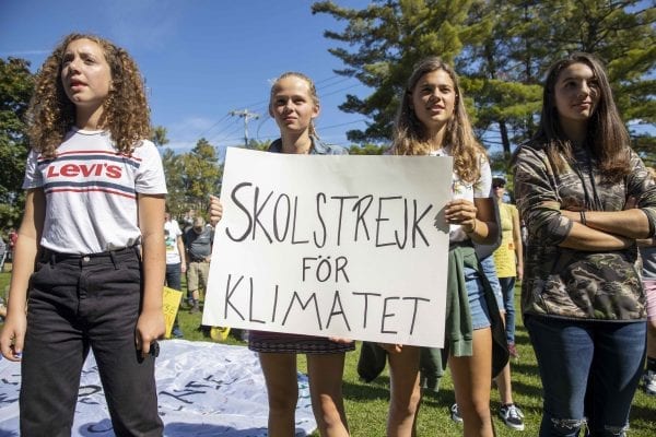 Many high school students from the Tri-Lakes left school to participate in climate strike held at Riverside Park in Saranac Lake on September 20. Overall several hundred people attended the demonstration. Photo by Mike Lynch