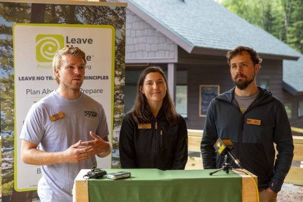 Representatives from the Leave No Trace Center for Outdoor Ethics, based in Boulder, Colorado, talk at the High Peaks Information Center in August. Photo by Mike Lynch