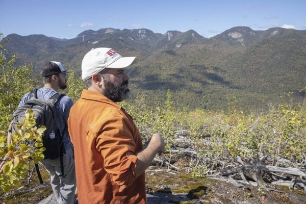 SUNY Plattsburgh Professor Mark Lesser and his students visited the 1999 Noonmark Fire site in September. Photo by Mike Lynch