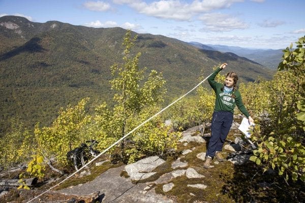 SUNY Plattsburgh Professor Mark Lesser and his students visited the 1999 Noonmark Fire site in September. Photo by Mike Lynch