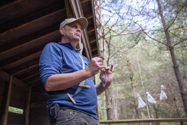 Eric Lind, director of community services and restoration for the New York state chapter of the Audobon Society, led a bird banding demonstration at The Wild Center in mid-August. Photo by Mike Lynch