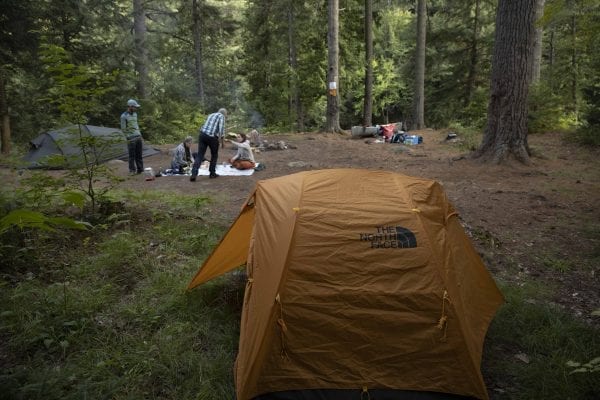 Olivier Van Herck and Zoë Agasi camped with family members at the bottom of Permanent Rapids on the Saranac River in August. Photo by Mike Lynch