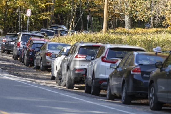 Cars parked illegally in the no-parking zone near the Roaring Brook Trailhead for Giant Mountain on Sunday, September 29. Photo by Mike Lynch