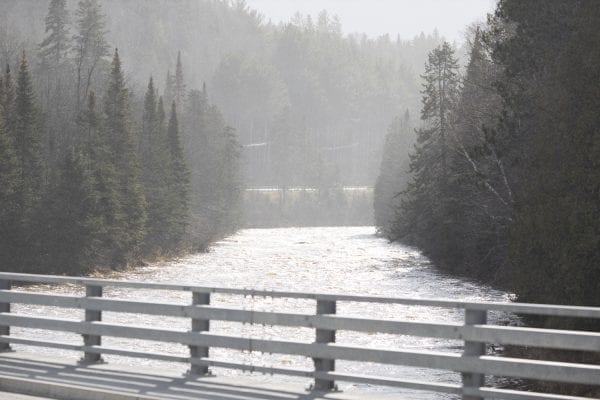 The West Branch of the Ausable River as seen from the Route 73 bridge near the Olympic Ski Jumps in Lake Placid. Photo by Mike Lynch