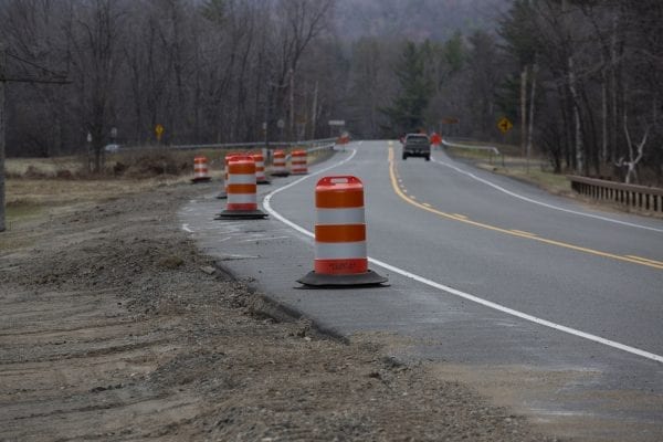 The shoulder of Route 73 near Marcy Field in Keene Valley washed out during the Halloween storm and had to be repaired. Photo by Mike Lynch