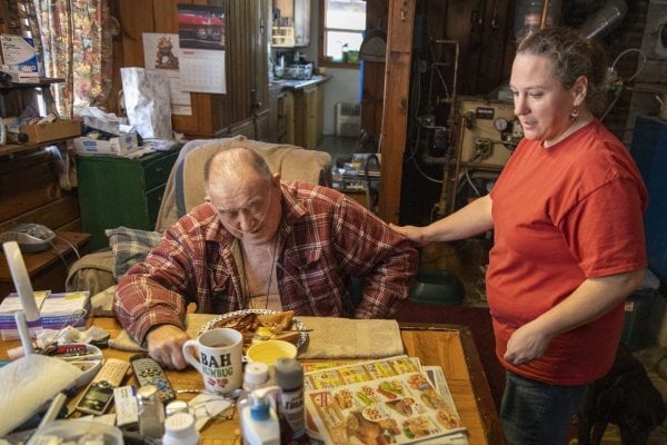 Home health aide Lisia Colegrove serves breakfast to client Thomas Wells. This image appeared in the January issue with a story about a need for home healthcare in the Adirondacks. Photo by Mike Lynch