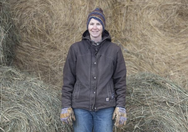 Racey Henderson poses in her barn. Photo by Mike Lynch