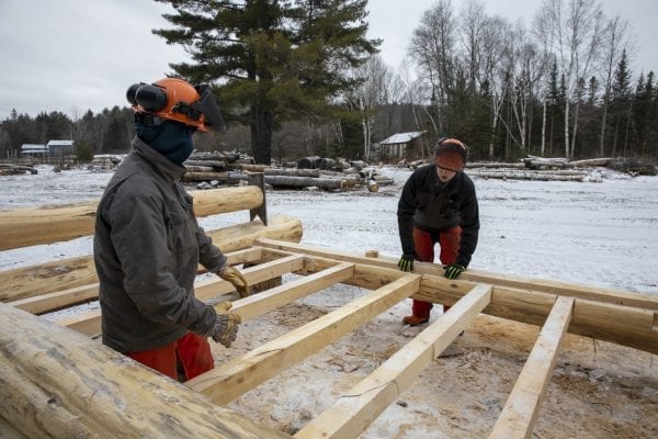 Bob Liseno is featured in the Trailblazer column of the March issue of the Explorer for his work with students in the BOCES program taught at the Adirondack Educational Center in Saranac Lake.  Here, Liseno teaches the students to build a lean-to on a cold January day. Photo by Mike Lynch