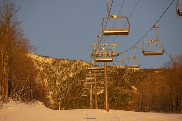 On cold winter mornings, skiers can be found skinning up Whiteface Mountain between the hours of 6 and 8:30 a.m. as part of the Uphill Skiing Program. Skiers do this for exercise, especially when there isn’t a lot of snow in the backcountry, to train for upcoming adventures, and to experience the scenery at sunrise. This activity has been occurring at Whiteface for decades, but it has become more popular and more regulated in recent years. Photo by Mike Lynch