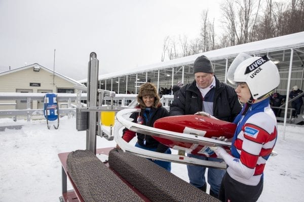 U.S. Luge official Peggy Mousaw, left, checks a sled during a competition in late February at Mount Van Hoevenberg. Mousaw will be featured in the Trailblazer column in the May issue of the Explorer. Photo by Mike Lynch