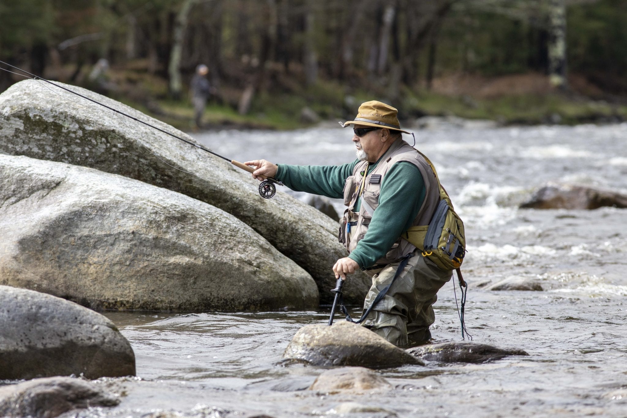 A man fishes in the Two-Fly Challenge on the West Branch of the Ausable River