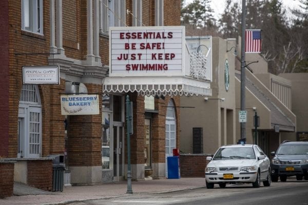 The Palace Theater in downtown Lake Placid has repurposed its sign out front this year to display messages to the public, which range from humorous to encouraging. Photo by Mike Lynch