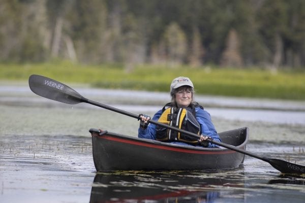 Joan Collins paddles Fishing Brook. Photo by Mike Lynch