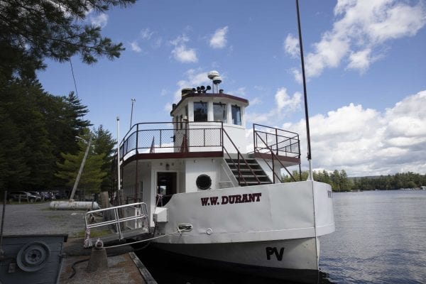 This photo gallery shows a sleepy but scenic Raquette Lake on a Friday afternoon. The quiet scene is a result of a slowdown in tourism due to the pandemic. Most years Friday afternoons in July in this tiny hamlet are much busier, with boats waiting for space on the bustling dock as vessels and visitors come and go. This gallery is part of "Snapshot," a multimedia series that captures a scene through photo galleries and videos. Photo by Mike Lynch