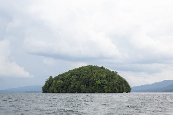 Question: Can you name this island? Hint: It's located on one of the most scenic lakes in the Adirondacks, and the island itself has rarely ever been visited by humans due to its protected status. 
Answer: Dome Island on Lake George.