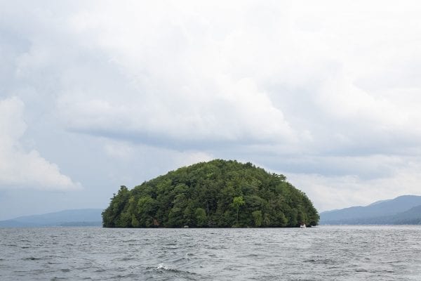 Question: Can you name this island? Hint: It's located on one of the most scenic lakes in the Adirondacks, and the island itself has rarely ever been visited by humans due to its protected status. 
Answer: Dome Island on Lake George.