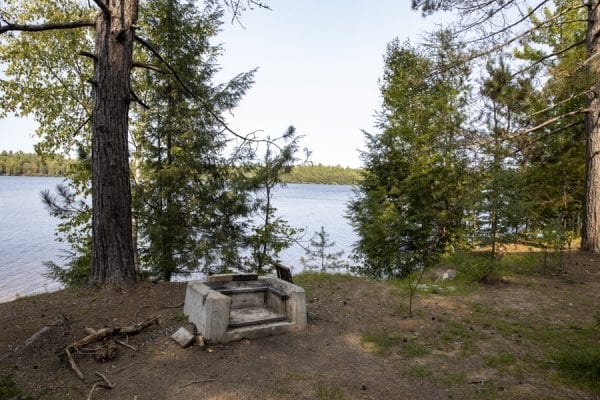 A fire pit by the water. Photo by Mike Lynch