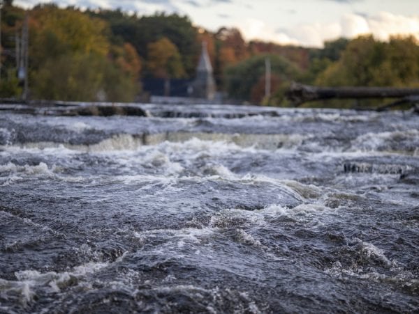 Looking upstream on the Boquet River in Willsboro. Spawning salmon must swim up this long series of cascades in order to reach the upper reaches of the river. Photo by Mike Lynch