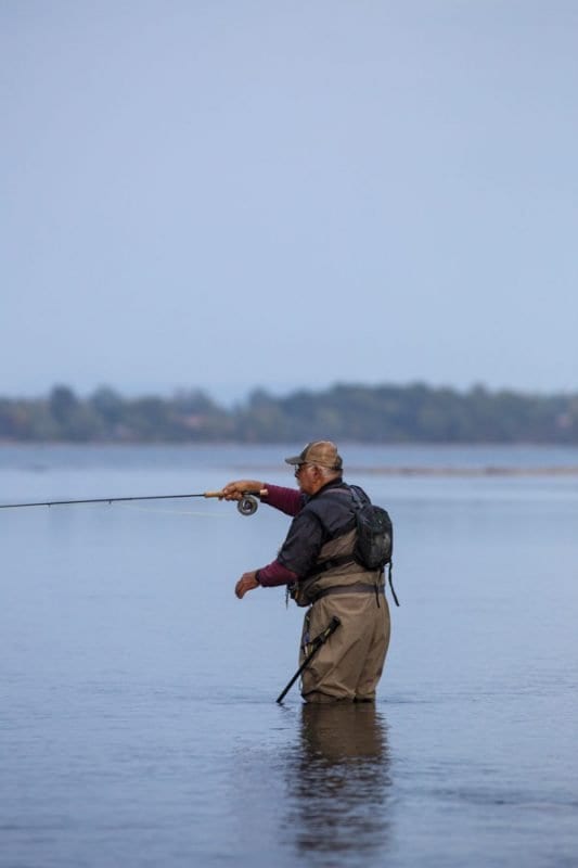 Lenny Carbonara tries to land a fall fish on a slow salmon day. Photo by Mike Lynch