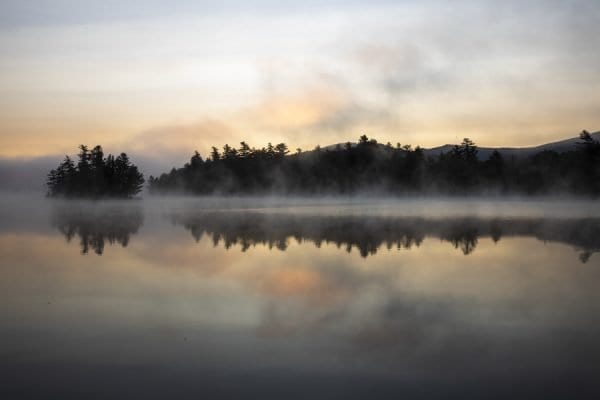 Franklin Falls Pond on a foggy September morning. Photo by Mike Lynch
