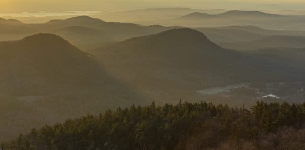 The view from Poke-O-Moonshine shortly after sunrise. Photo by Mike Lynch
