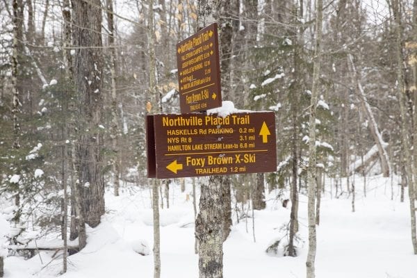 A trail sign on the Foxy Brown trail, which connects to the Northville-Placid Trail for a stretch as it goes through the West Canada Lakes Wilderness. Photo by Mike Lynch