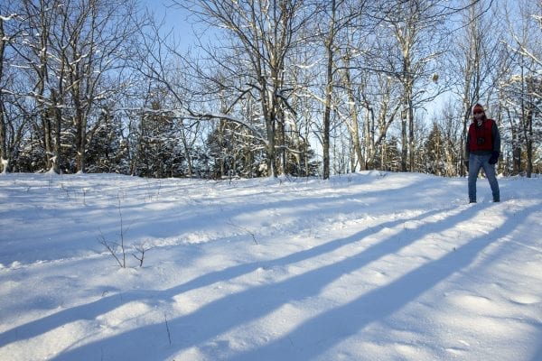 CATS Stewardship Coordinator Bill Amadon hikes North Boquet Mountain. Photo by Mike Lynch
